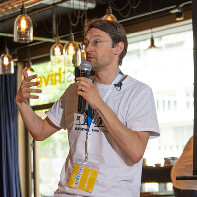 Jeremy Chatelaine, founder of QuickMail & MonsterOps, standing in front of a whiteboard